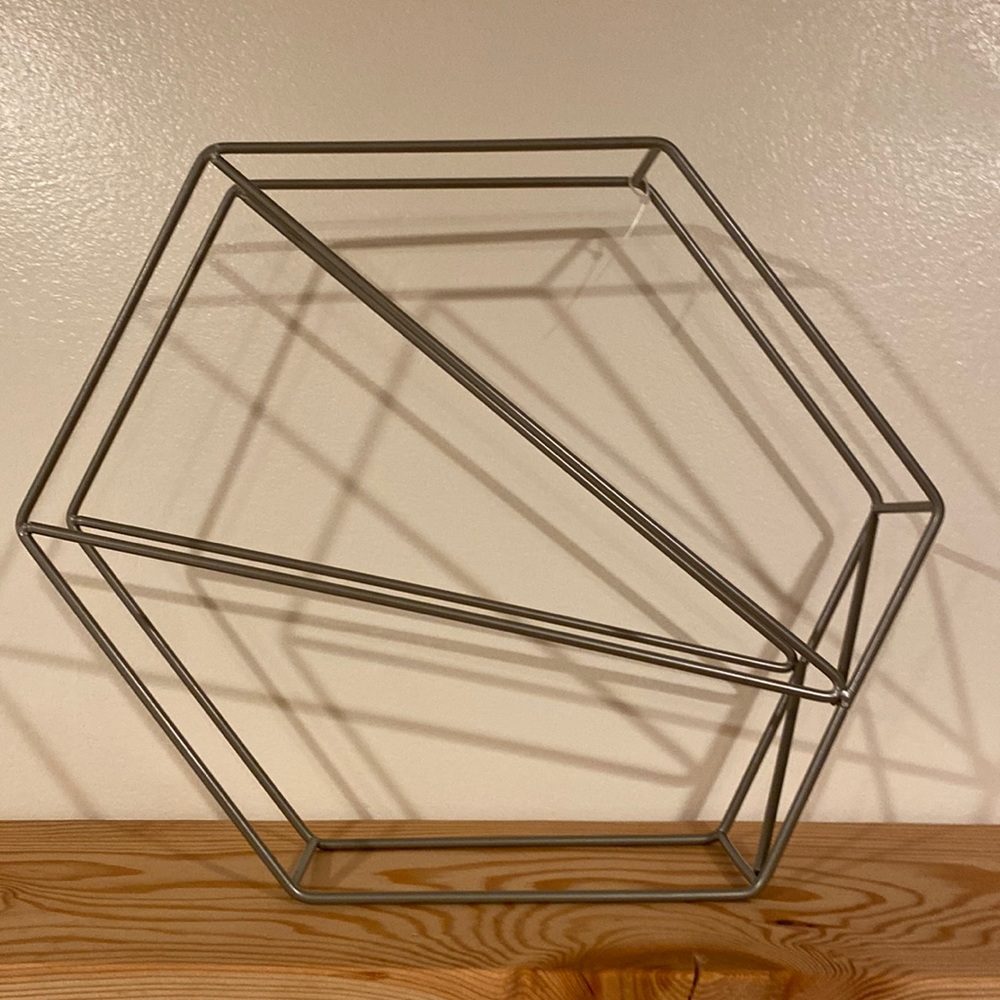 Metal magazine holder